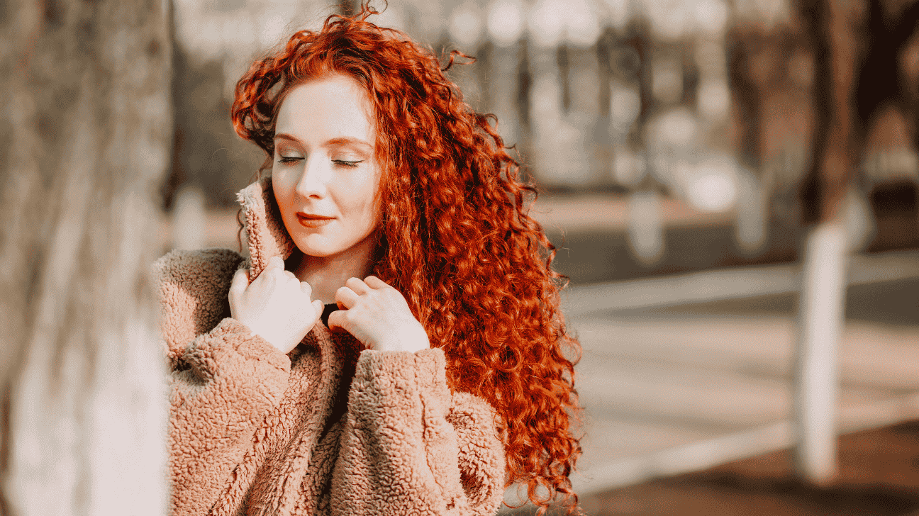 Charming redhead girl with strong and healthier hairs