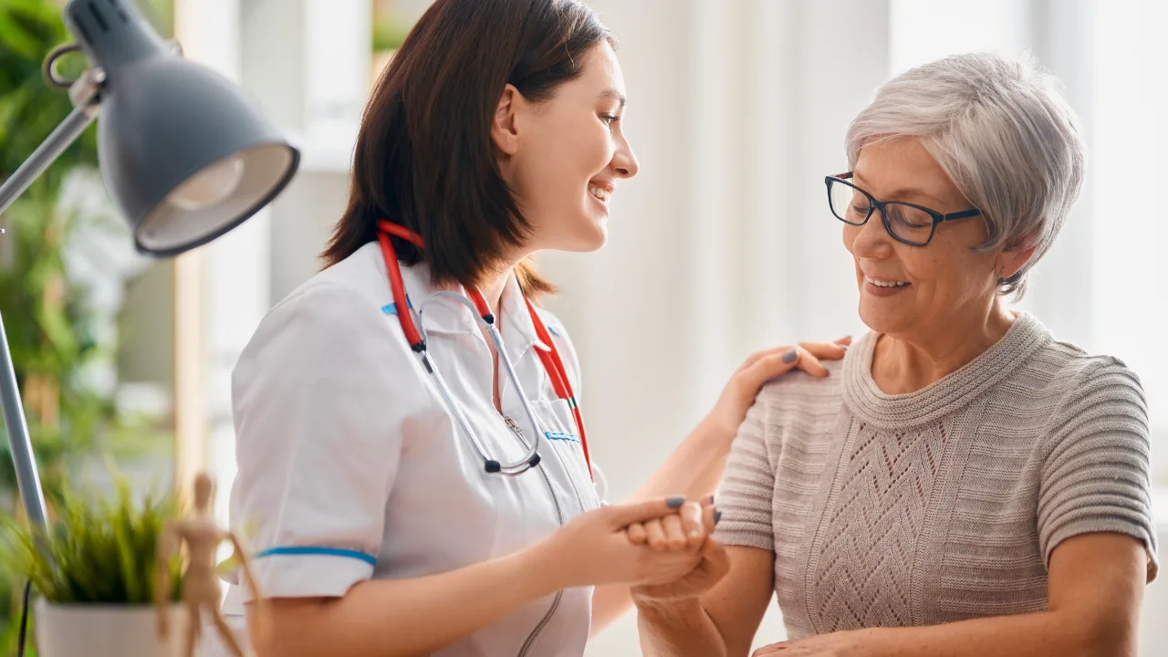 Old lady consulting with female doctor regarding hypertension management