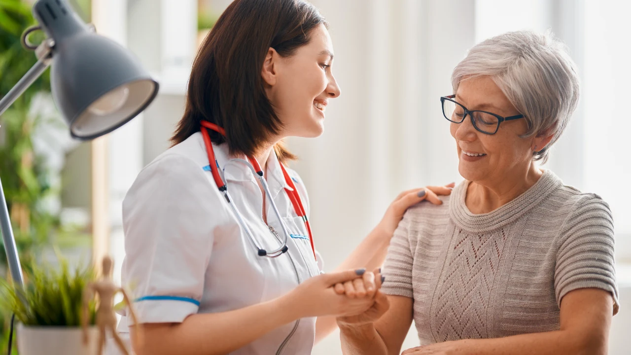 aged old woman Consulting with doctor